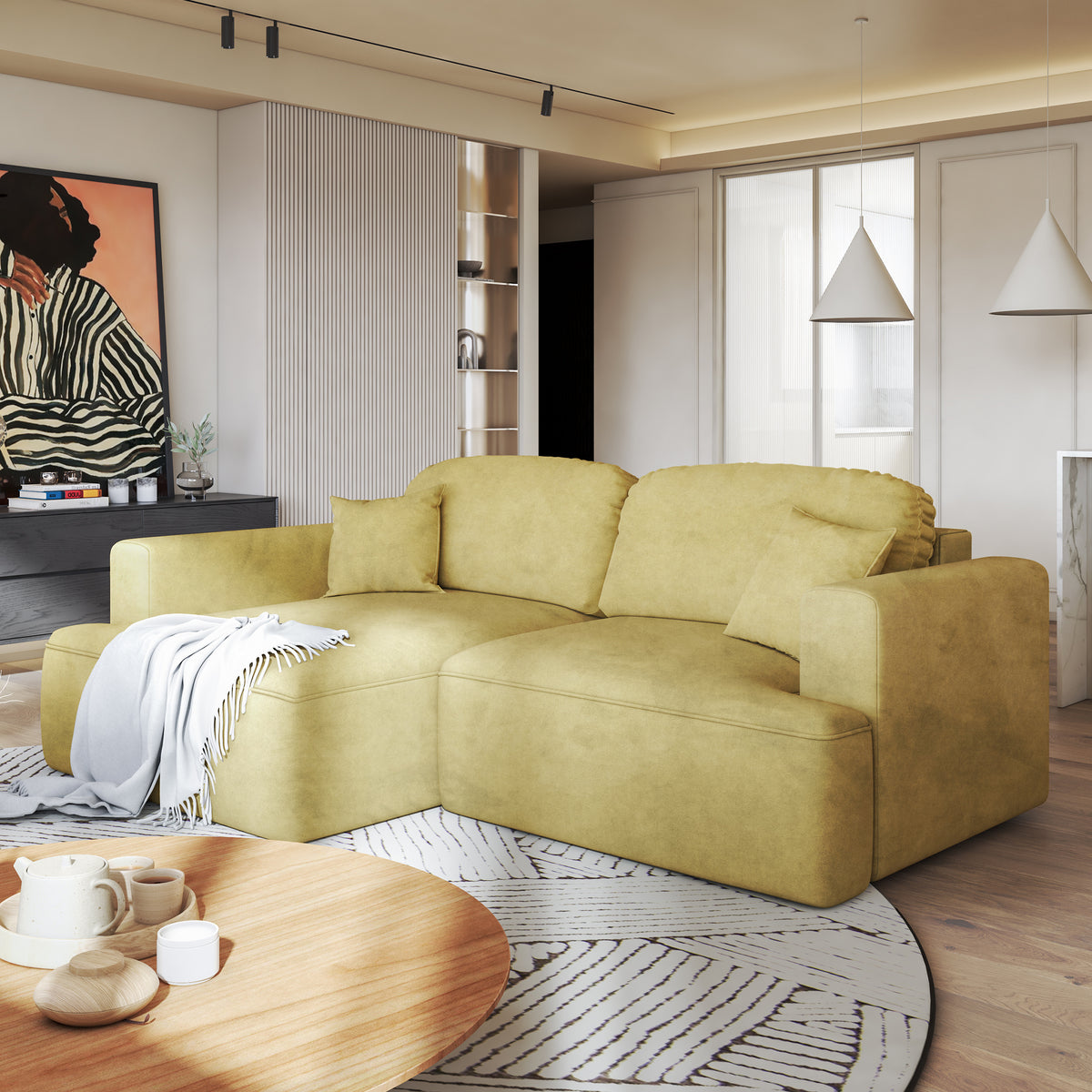 Ecksofa Senvali 240 cm Golden Sepia (CLOUD 32) linksseitig im Wohnzimmer mit rundem Tisch und einer Decke auf der Récamiere