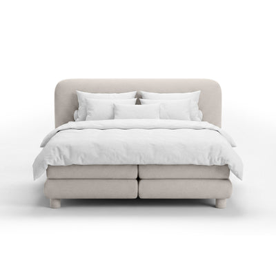Kontinentalbett mit abgerundetem Kopfteil im Modern-Organic-Stil | Portela