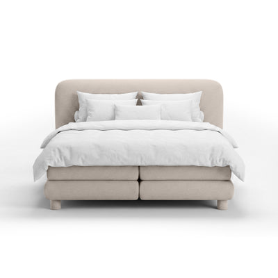 Kontinentalbett mit abgerundetem Kopfteil im Modern-Organic-Stil | Portela