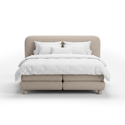 Kontinentalbett mit abgerundetem Kopfteil im Modern-Organic-Stil | Portela