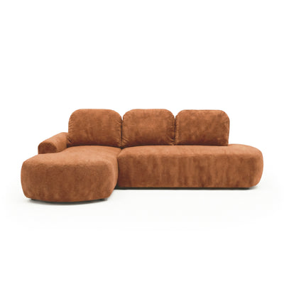 Ecksofa Moluni 263 cm Rostkastanie (BELLINI 09) linksseitig – rundliches Ecksofa mit Schlaffunktion, Ansicht von vorne