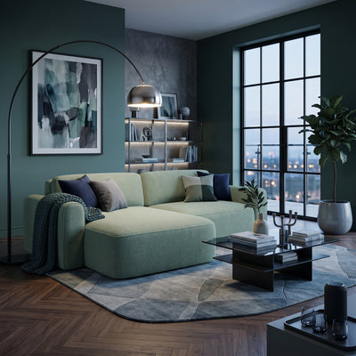 Ecksofa Saniri linksseitig in hellem Grün im Wohnzimmer mit Stadtblick – Ecksofa fürs Wohnzimmer
